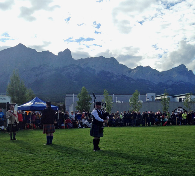 Rocky Mountain Pipe-Major Sean Somers plays "AMazing Grace" at the Canmore games massed bands.