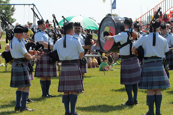 P-M Terry Cleland leads the 400 Squadron Pipe Band at the Cobourg Highland Games, Cobourg, Ontario, July 2013.