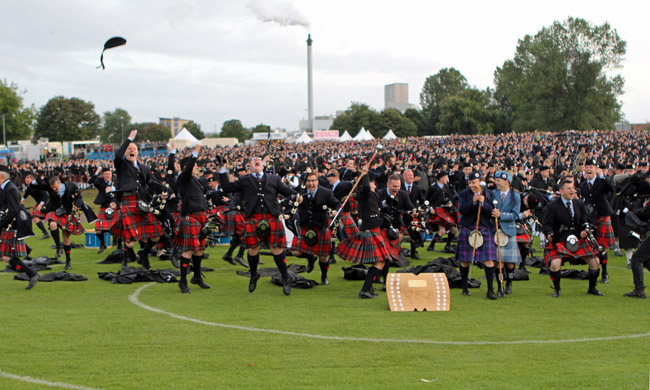 Field Marshal Montgomery celebrates at the moment of the announcement of their win of the 2014 World Pipe Band Championship.