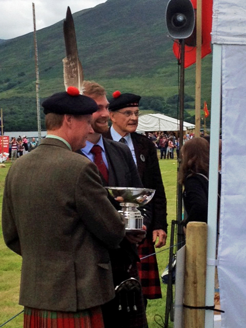 Derek Midgley receiving the piobaireachd trophy at the Lochearnhead games, another feather in his cap.