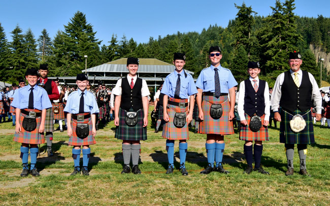Solo piping 2016 BCPA Grand Aggregate winners (L-R): Ronan Terry, Callum Bevan, Vienna Scheyer, Sam Toohey, Charles Morris, Tori Killoran, Barry Kirk.