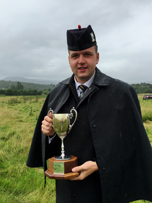 Ben Duncan with the overall trophy from Newtonmore Games.