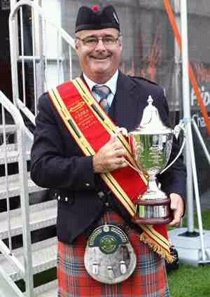 Kilpatrick in 2010 with one of his 88 championship awards as a leading-drummer.
