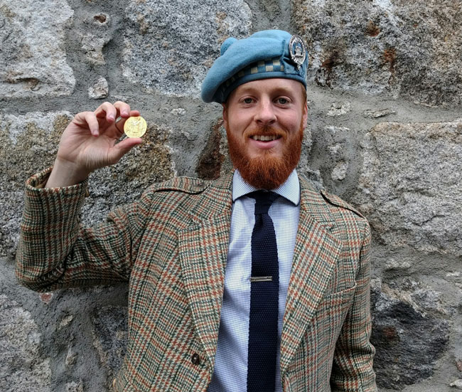 Nick Hudson with the Braemar Gold Medal for piobaireachd.