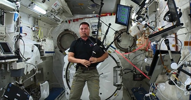 Astronaut Kjell Lindgren plays "Amazing Grace" in space.