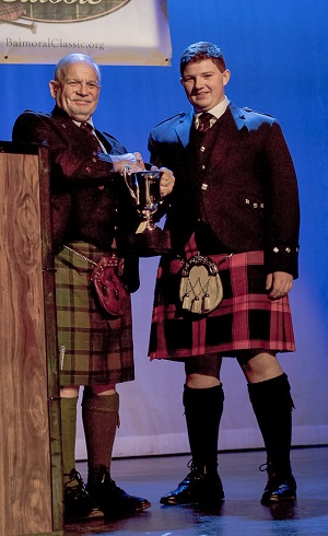 MacKenzie Chamberlain accepts the snare drumming trophy.
