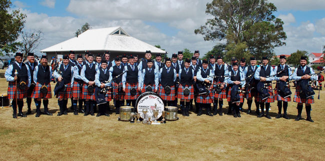 The Wellington Police Pipe Band celebrate their success at Feilding.