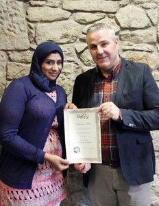 Athari Al-Harrassi with instructor Wilson Brown.
