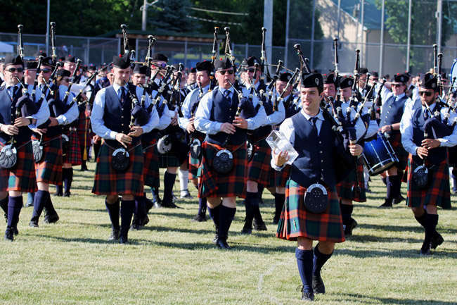 The 78th Fraser Highlanders Pipe Band march off winners of Grade 1 at the 2016 Georgetown Highland Games.