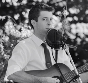 Alastair Lee on guitar at another event.