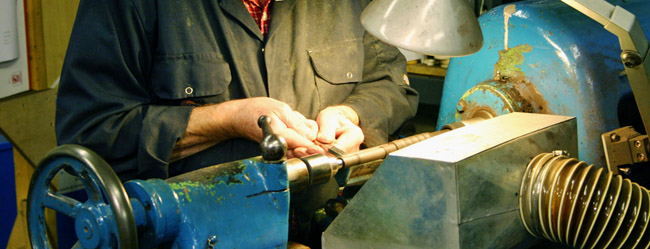 Traditional turning of blackwood pipes.