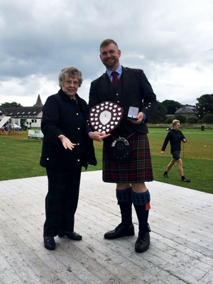 Derek Midgley with his overall prizes at Dornoch