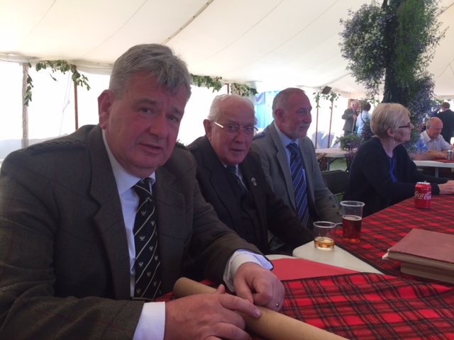 Colin MacLellan and Ian MacLellan relaxing after the day's judging.