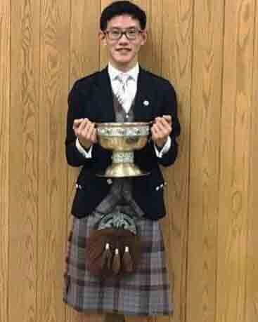 Filemon Tan with the 2018 Nicol-Brown Chalice.