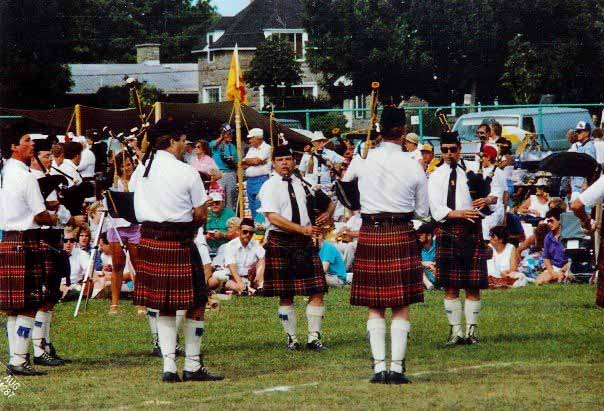 Bill Barr, second from left, competing with Scottish-Irish Imports at the Glengarry Highland Games at Maxville, Ontario, August 1987, the pipe-major then was Tim Carey.