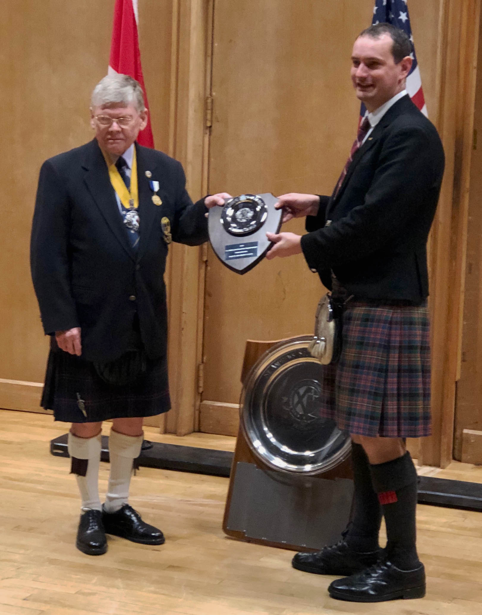 Andrew Carlisle accepts the overall professional trophy at the 2019 USPF.