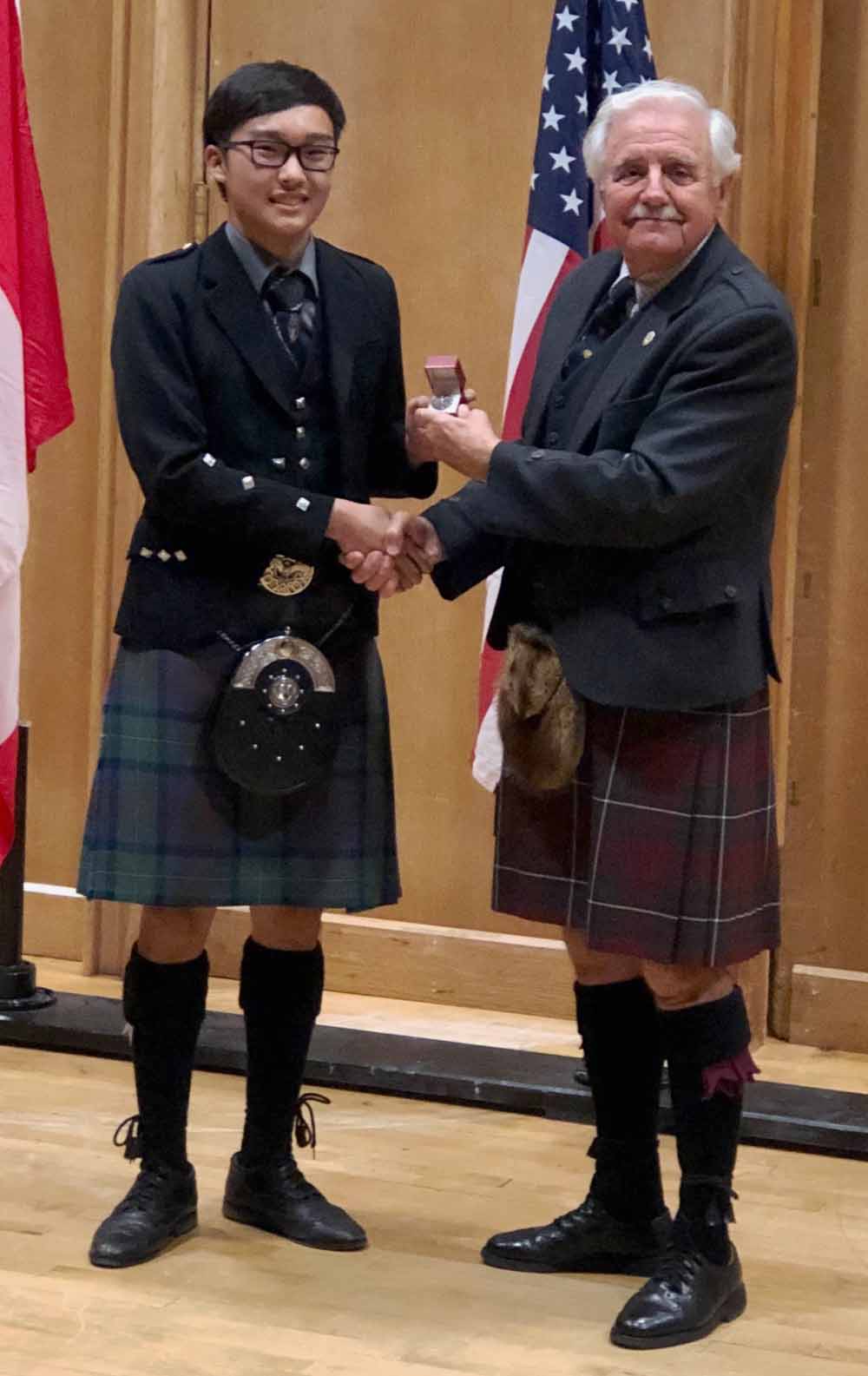 Kevin Darmadi is presented with the 2019 USPF Amateur overall award.