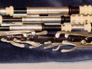 A detail of a Colin Ross Northumbrian smallpipe, showing the handmade Northumbrian chanter keys.