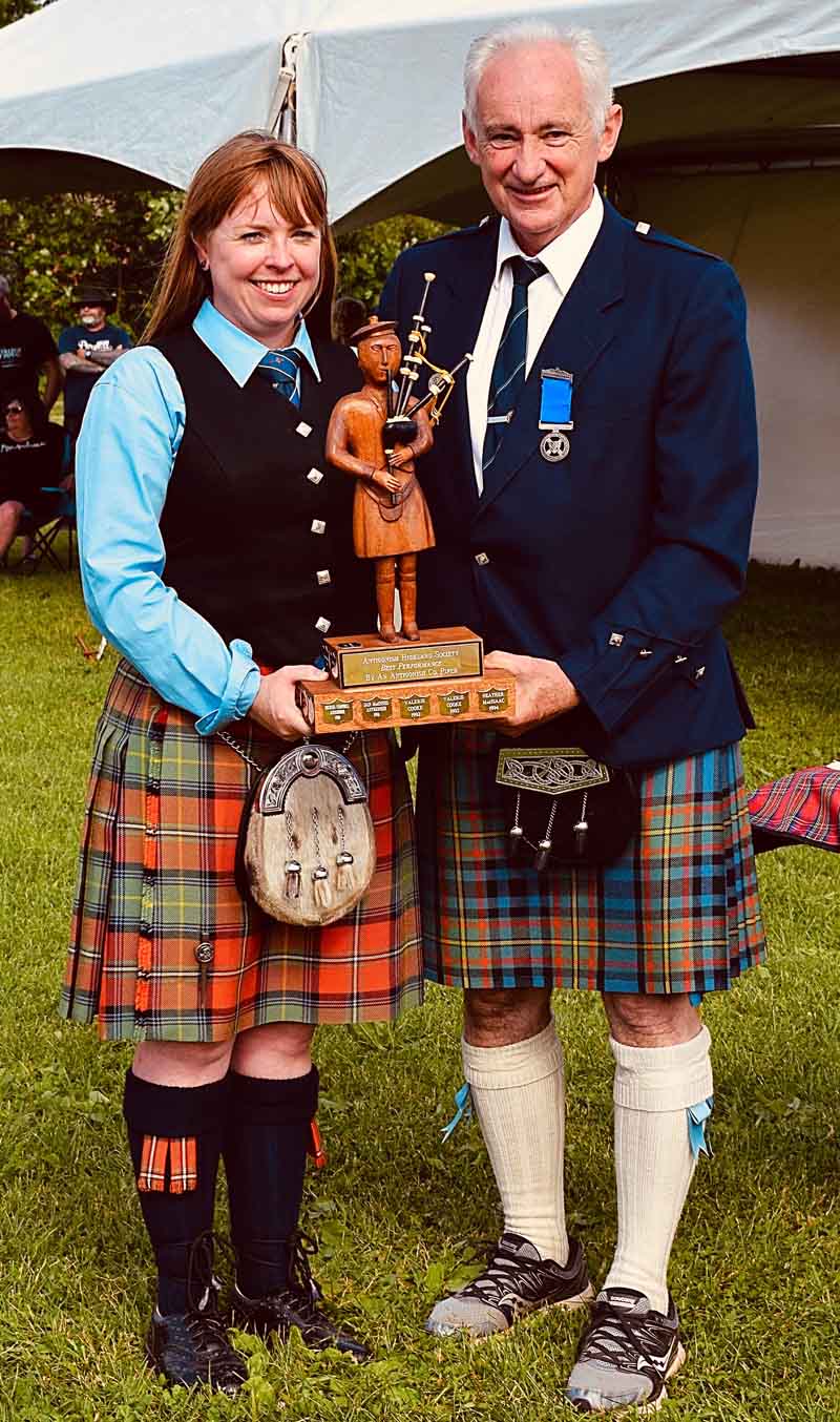 Andrea Boyd receiving the Atlantic Canada Piobaireachd trophy.