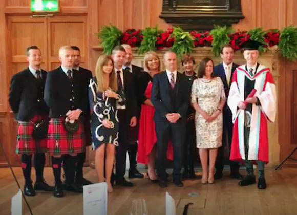 Richard Parkes with family and friends at Queen's University Belfast where he received his honorary doctorate on July 1, 2019.