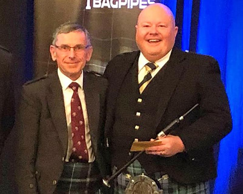 Andrew Roach (right) with judge Jack Taylor after winning the 2019 New Zealand Silver Chanter MSR.