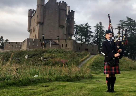 Eleven-year-old Craig Mitchell wins Best Video Background, performing "Lament for the Old Sword" in front of Braemar Castle in Scotland.