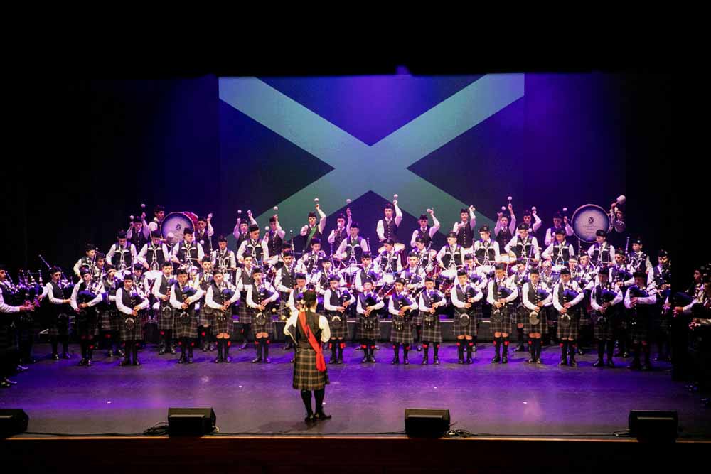 The St. Andrews College Pipe Bands performing together in Christchurch.