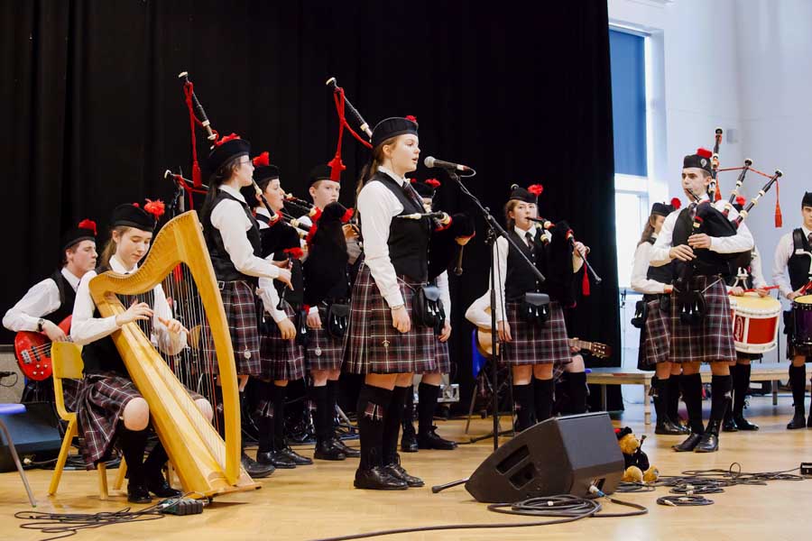A band competing on stage at the 2018 Scottish Schools Championships.