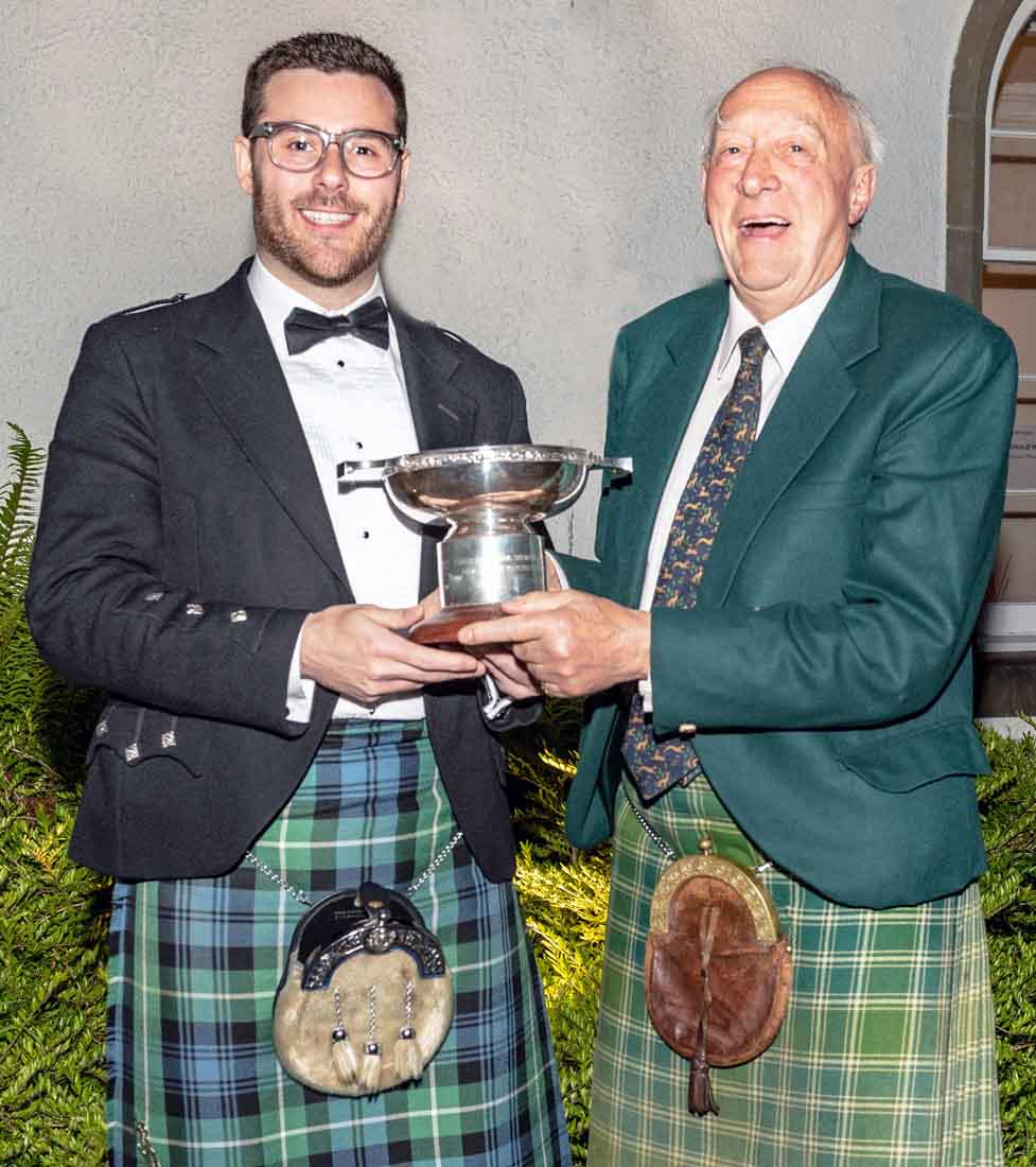 Glenn Brown presented with the 2019 Donald MacDonald Cuach by clan chief and CDLT trustee Godfrey, Lord Macdonald.