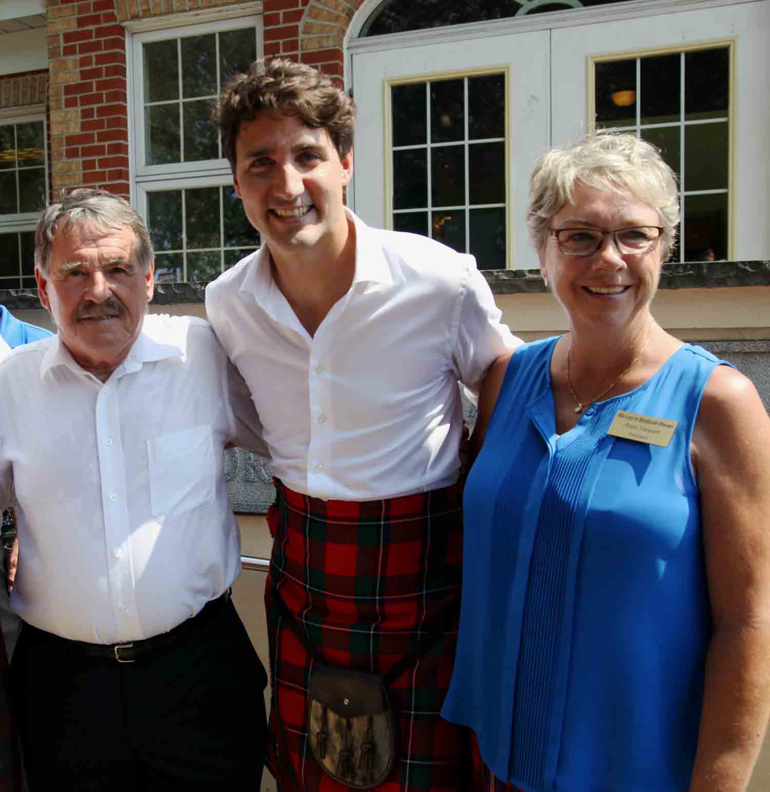 Anne Stewart with Bill Livingstone, far left, and some interloper . . . Canadian Prime-Minister Justin Trudeau.