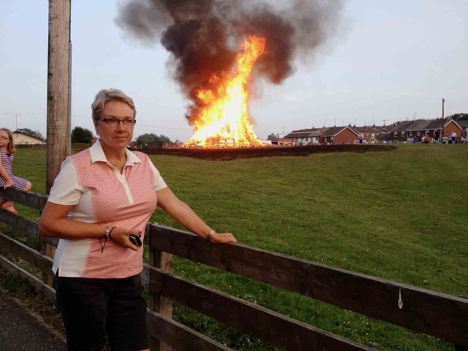 Meaghan's mom trying not to pay no nevermind to a traditional bonfire in Northern Ireland.