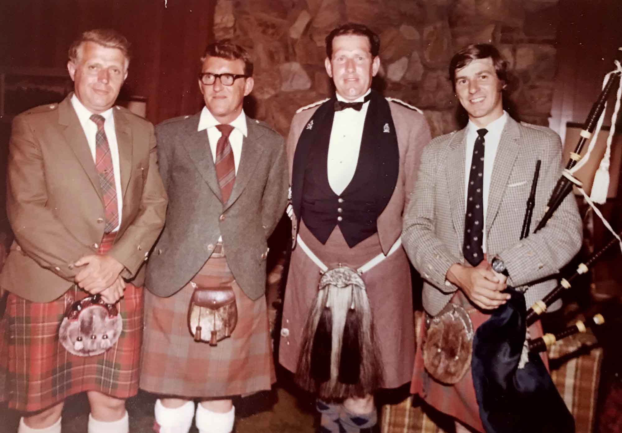 Two luminaries of Eastern United States piping and drumming, Sandy Jones (second from left) and Roddy MacDonald (far right) with the Canadian drum-major Norman MacKenzie in the 1960s. (The person at far left in unidentified.)