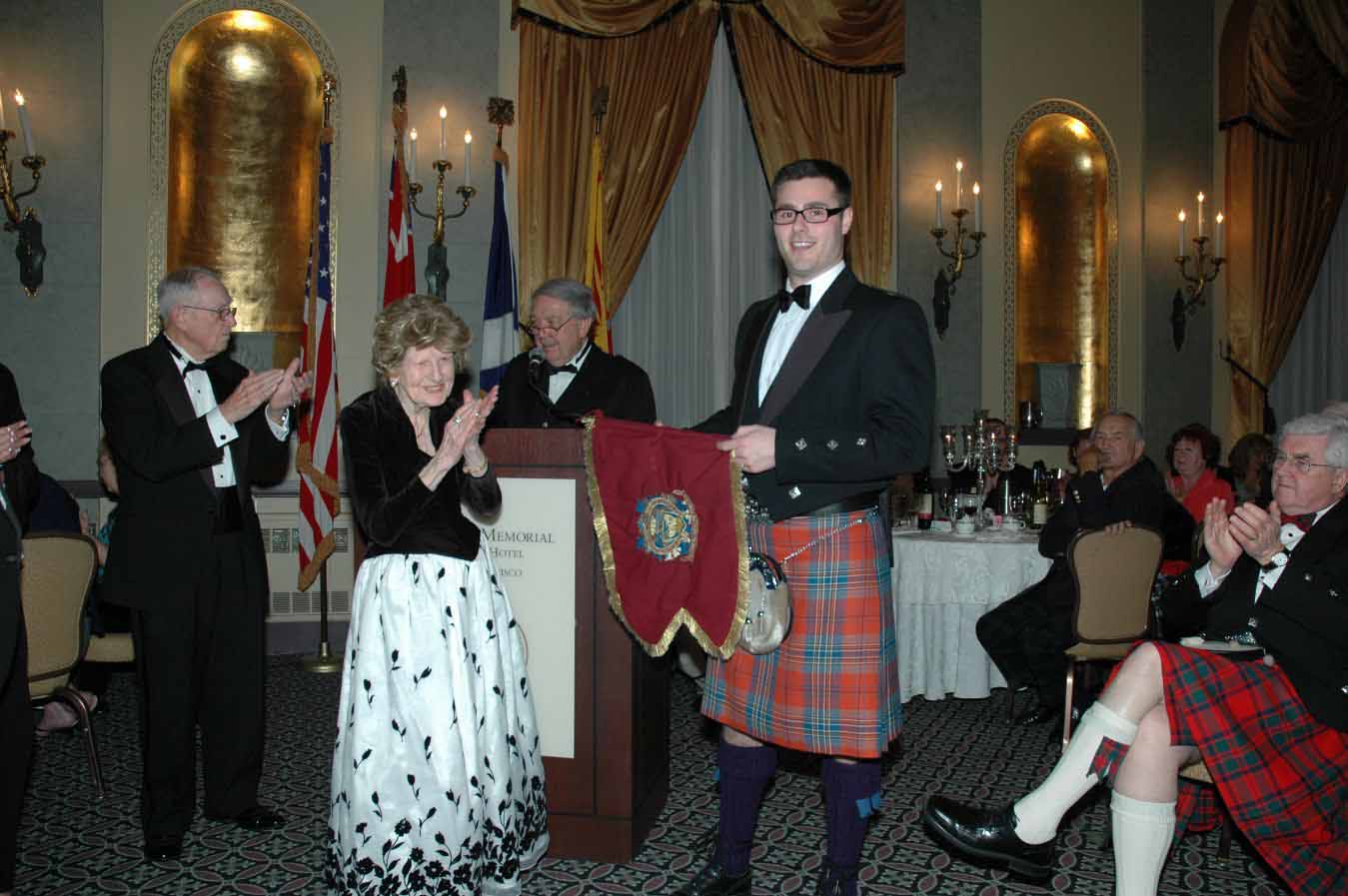 Glenn Brown accepts the overall prize in the 2007 Cameron-Gillies event, created for 'up and coming' pipers.