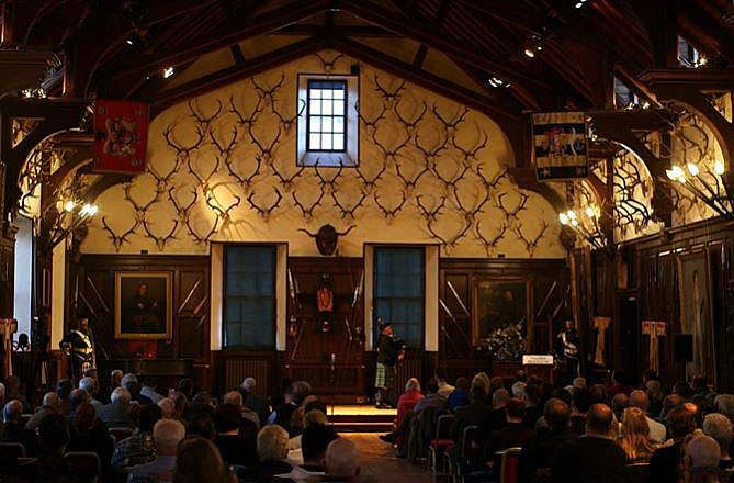 The Great Hall of Blair Castle, audience listening to Willie McCallum.