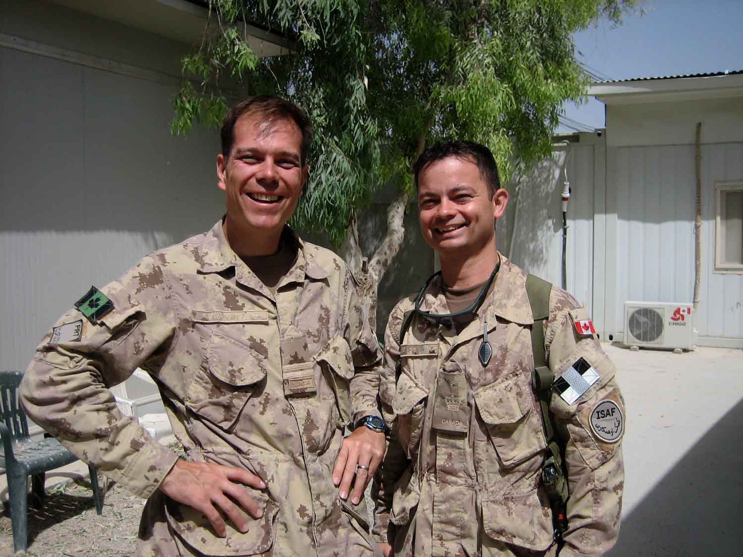 Captain Fraser Clark with the well-known piper, then-Warrant Officer Colin Clansey at the Kandahar Airfield, 2008. Clansey remains with the military, currently serving at a NORAD facility in Oklahoma.