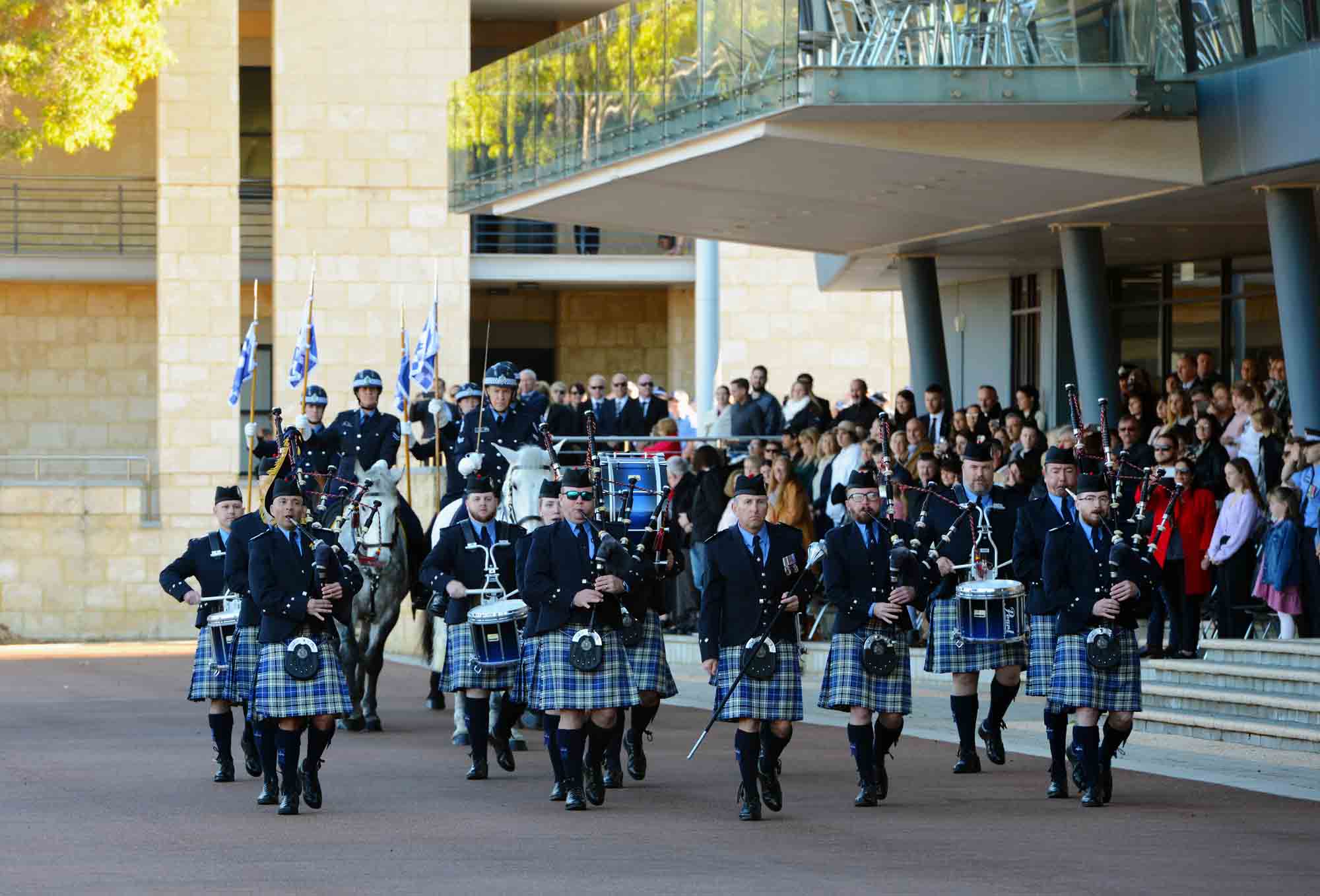 A small section of the band performing at a police graduation ceremony, 2021.