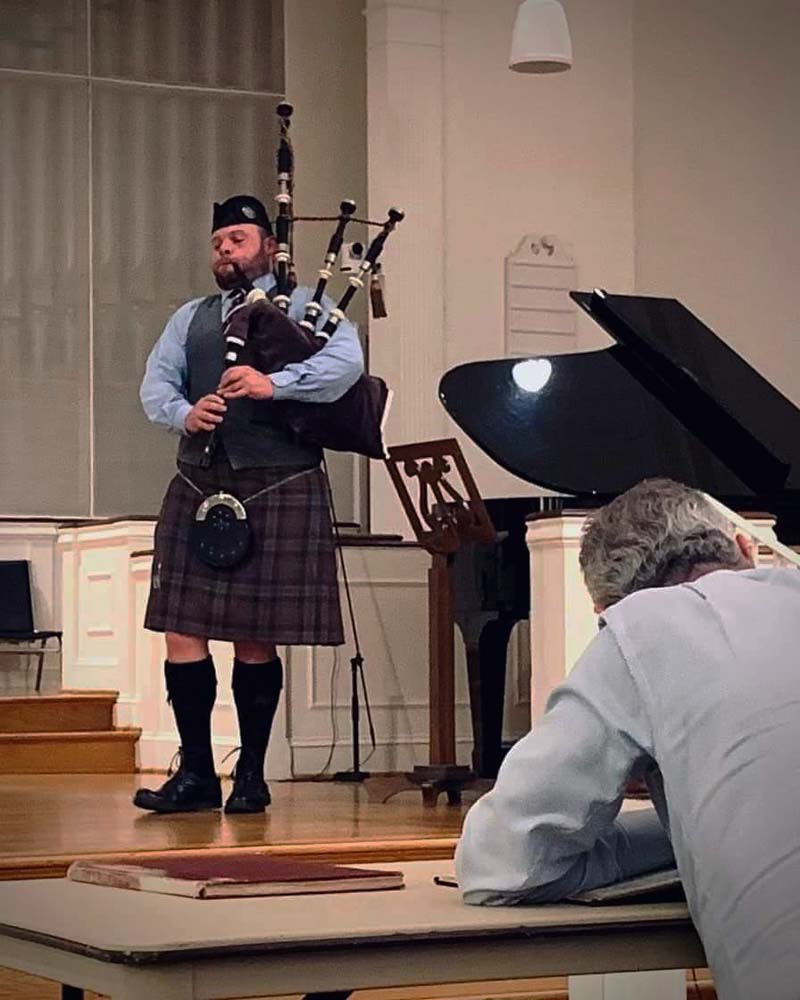 Dan Lyden competing in the Friday night solo piping competitions at the 2022 Colonial Highland Gathering.