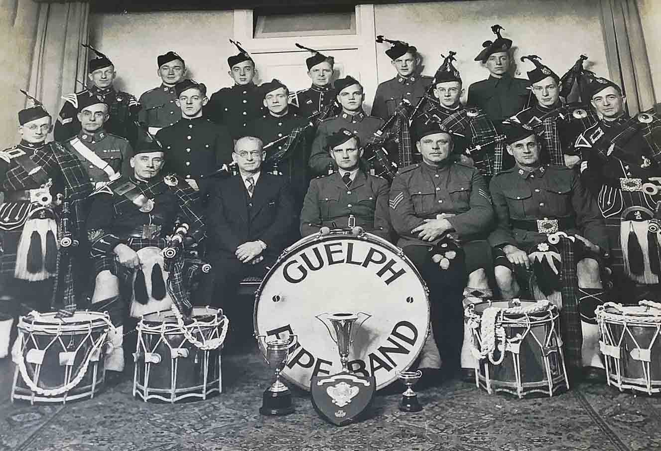Guelph Pipe Band with Pipe-Major Arthur Corstorphine at far left, c.1950.