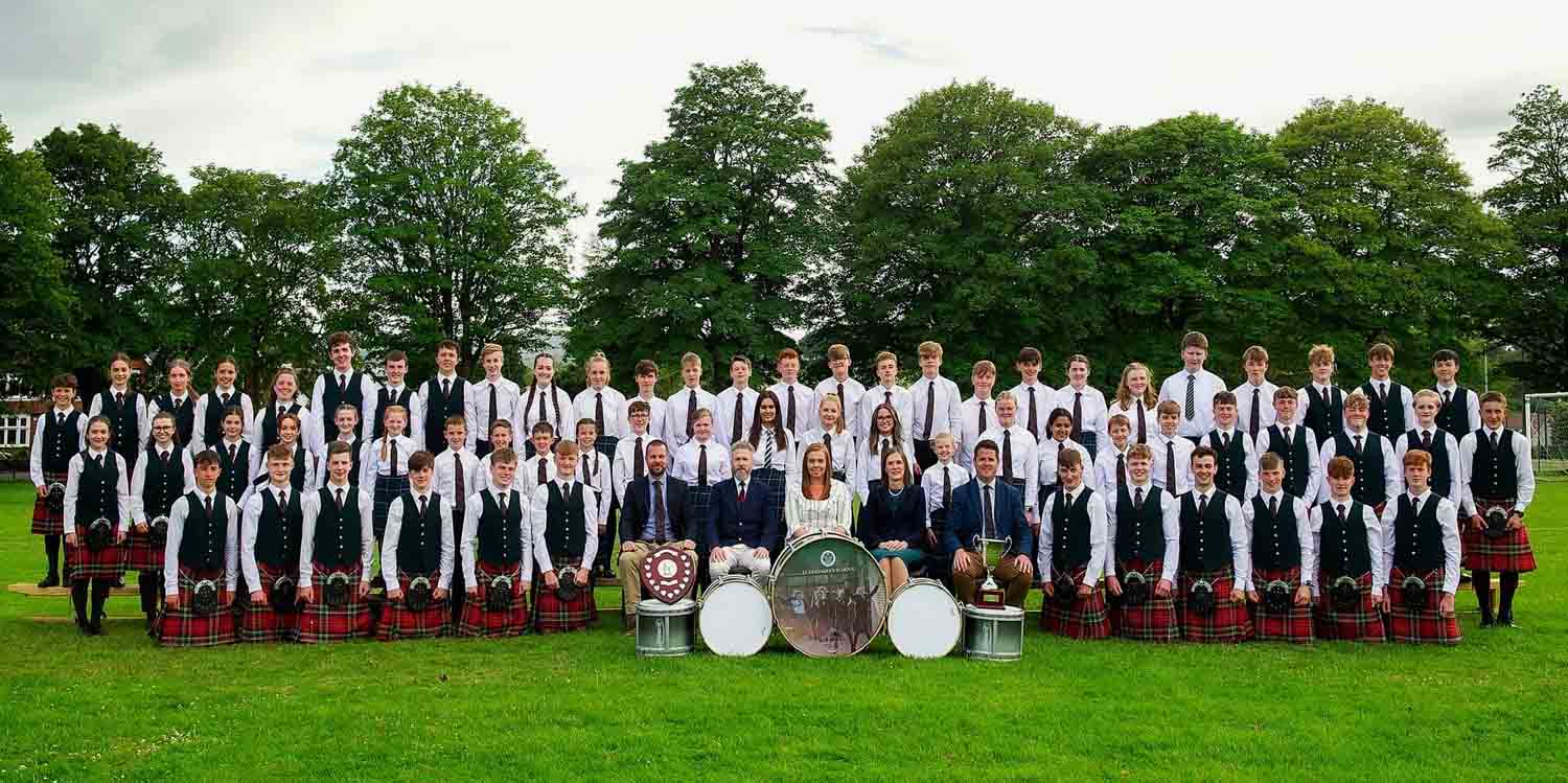Students and staff in the St Columba's School piping and drumming program.