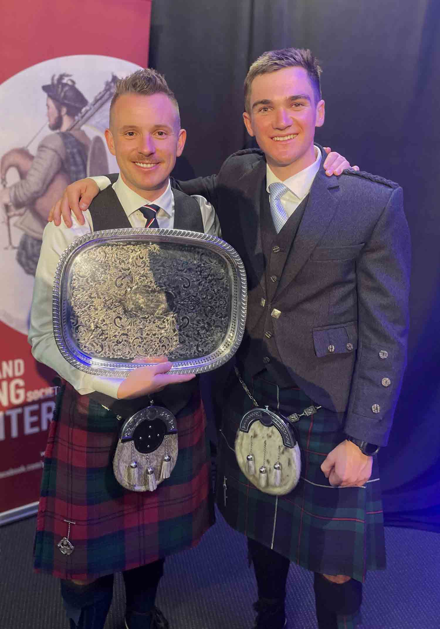 NZ Silver Chanter prize-winners (L-R): Piers Dover, Scott Armstrong, Logan Dale and Hamish Reade with sponsor Graeme Bryce on behalf of McCallum Bagpipes and Bryce's Bagpipes.