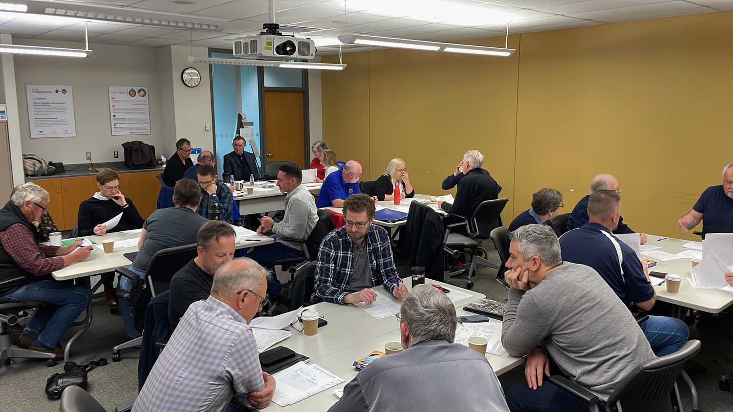 PPBSO piping judges ponder ponder performances at the 2023 Adjudicators' Seminar.