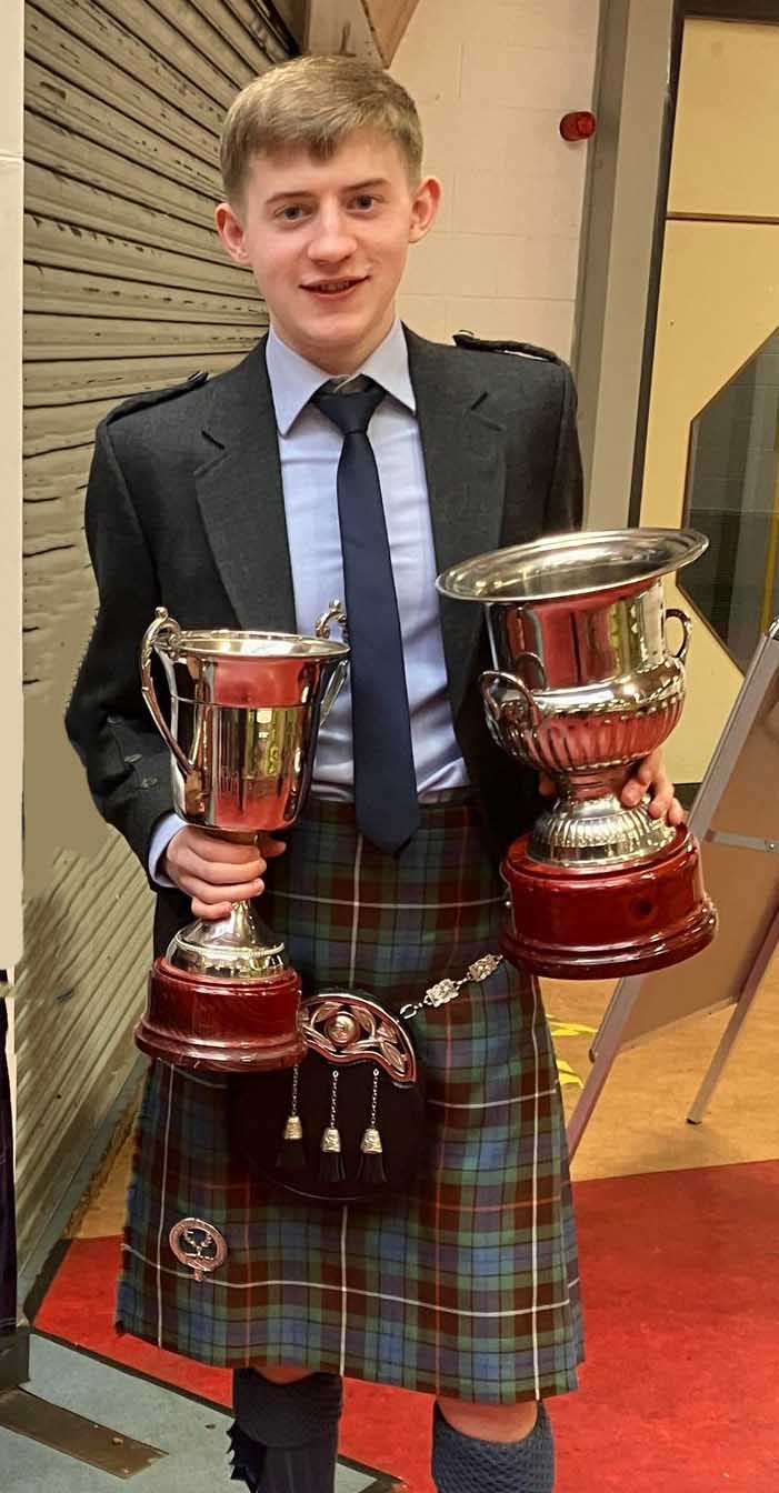 Callum Davidson with his solo piping hardware after a successful day at the Kingdom Thistle competition.