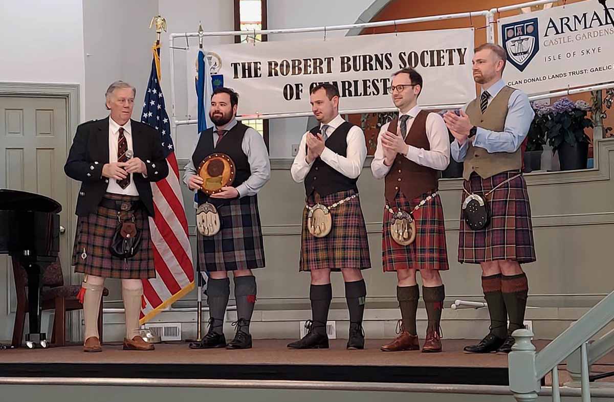 Competitors with organizer Peter Armstrong (furthest left) at the Joseph MacDonald Memorial Prize for Piobaireachd (L-R): Andrew Donlon, Andrew Carlisle. Ben McClamrock and Derek Midgley.