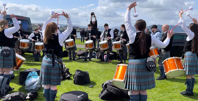 Peoples Ford Boghall & Bathgate Caledonia's drums corps prepping at the 2023 Gourock Games.