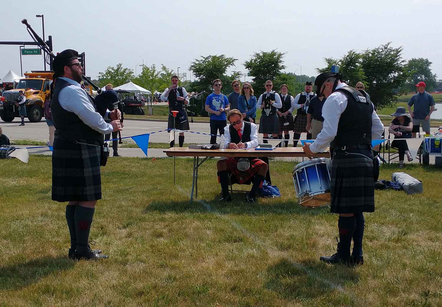 Judge Gordon Parkes assess a solo snare drumming competitor.