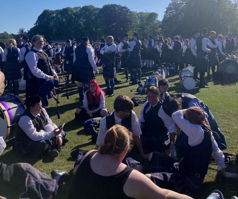 Basking in the sun at the march-past during a warm and sunny 2023 European Championships at Duthie Park, Aberdeen.
