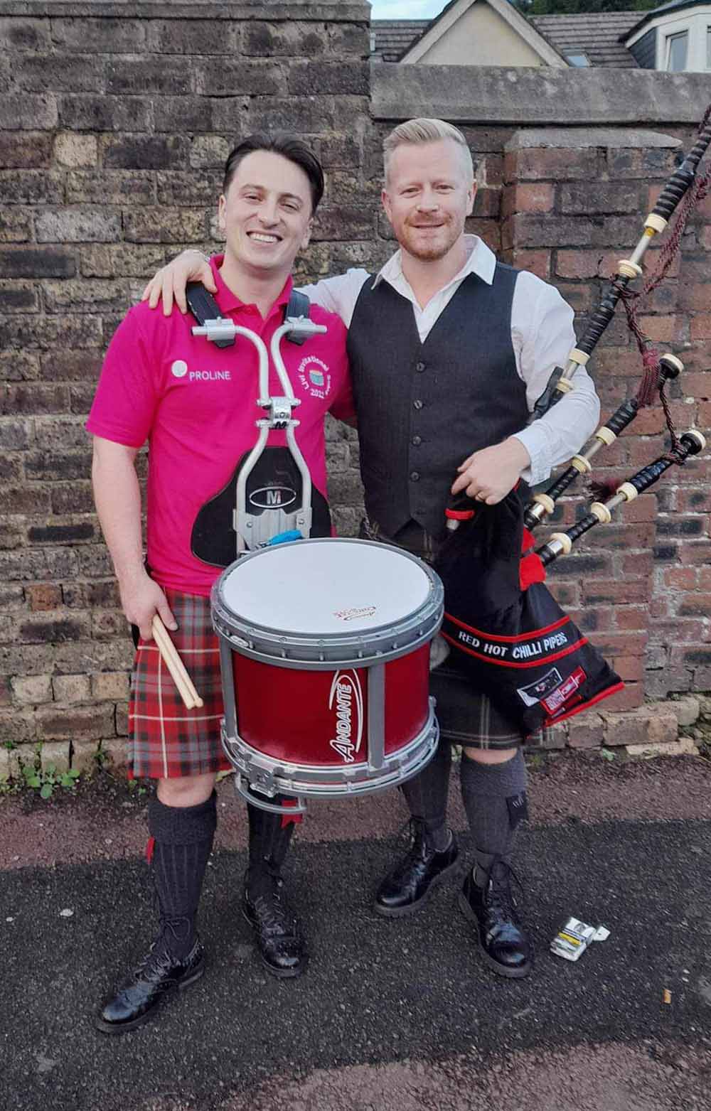 2022 LIVI Invitational winner Grant Cassidy with his piper, Craig Munroe.