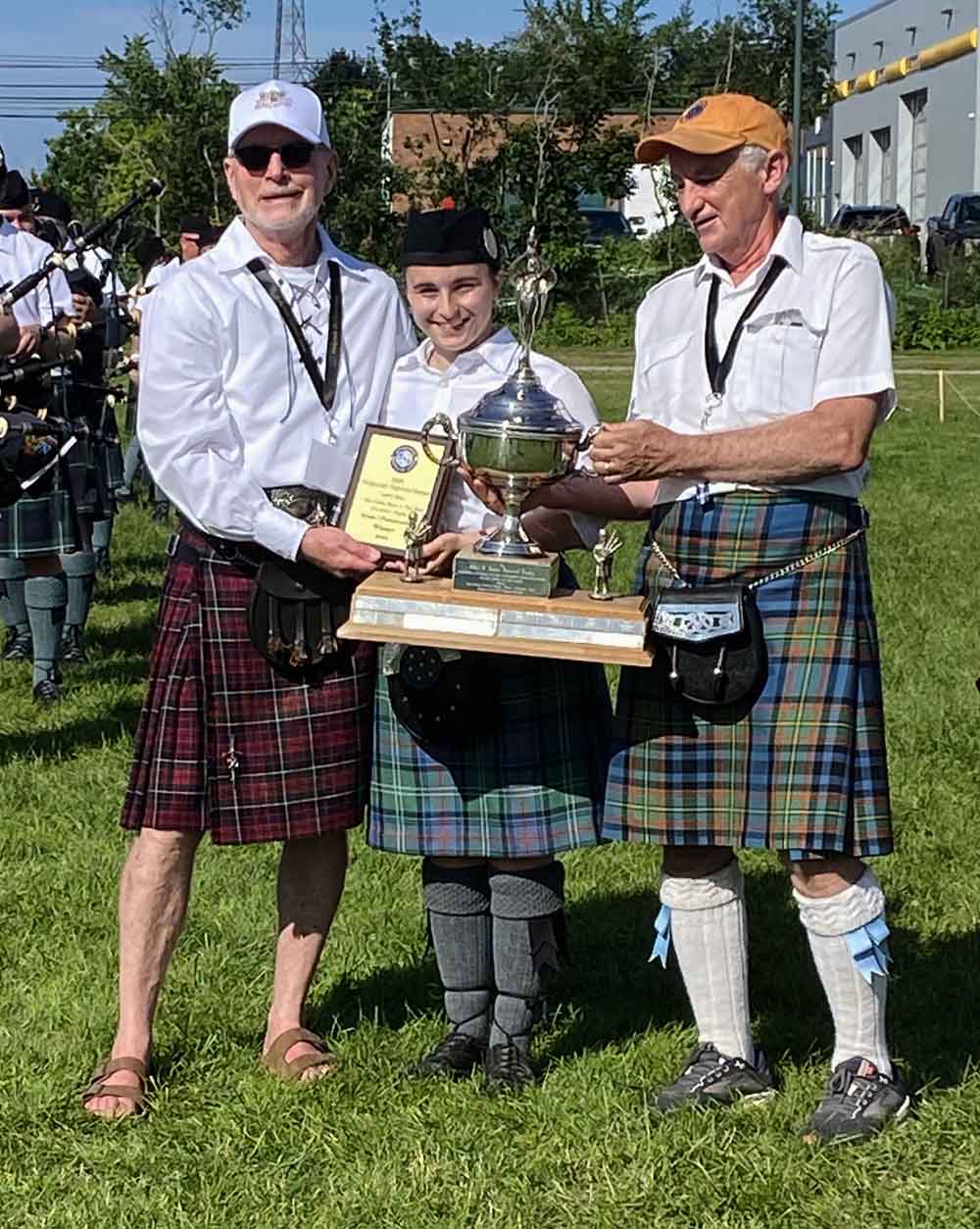 Gillian Blaney takes home the big Grade 1 amateur solo piping trophies at the 2023 Antigonish Highland Games.