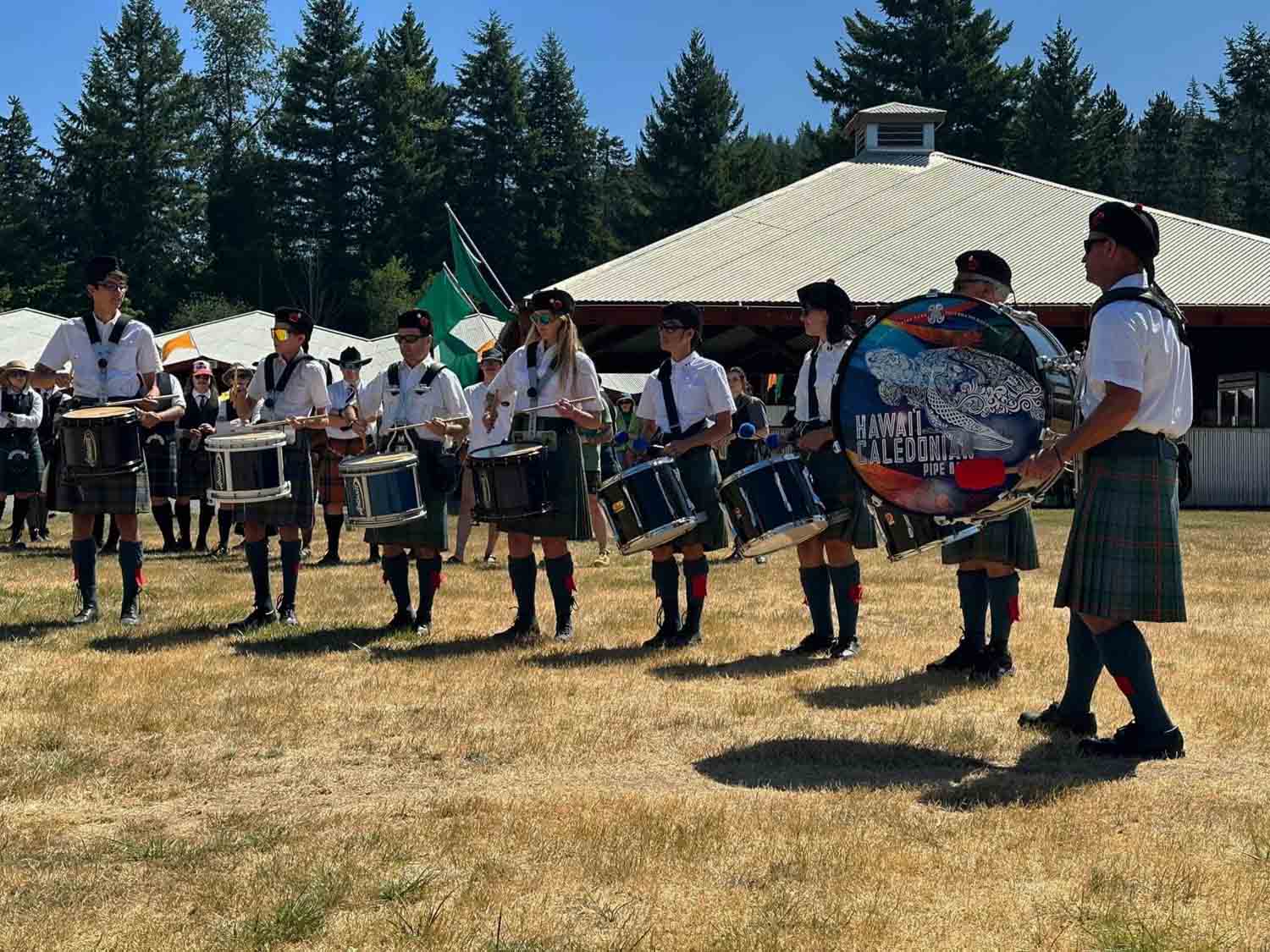 Hawai'i Caledonian percussionists playing in the Drum Corps Fanfare competition.