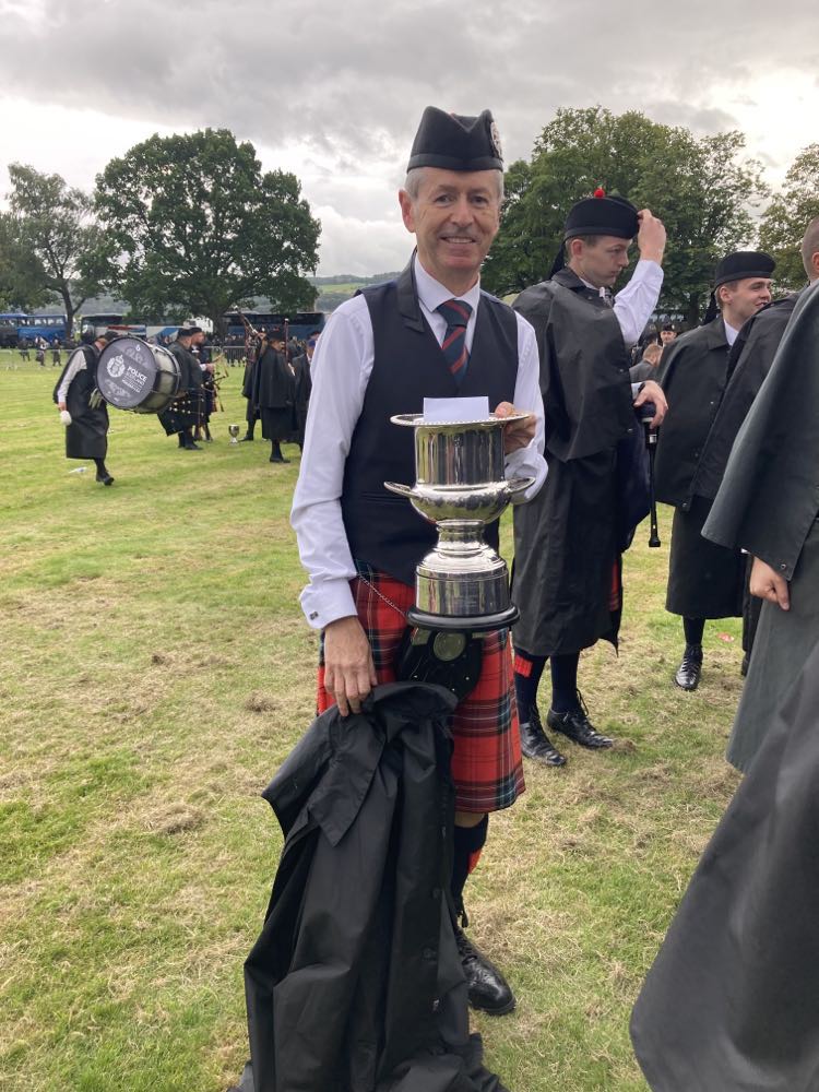 Field Marshal Montgomery Pipe-Major Richard Parkes with the 2023 Scottish Championship trophy.